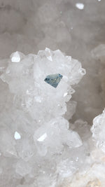 Load image into Gallery viewer, Montana Sapphire 1.22 CT Light Blue with Peach Center Round Brilliant Cut
