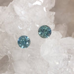 Load image into Gallery viewer, Montana Sapphire 1.84 CTW Color Change Teal Blue Sea-Foam Periwinkle Green Gray Yellow Peach Round Cut - Oddly Paired
