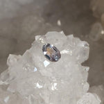 Load image into Gallery viewer, Montana Sapphire .64 CT Silver with Peach and Lavender Oval Cut

