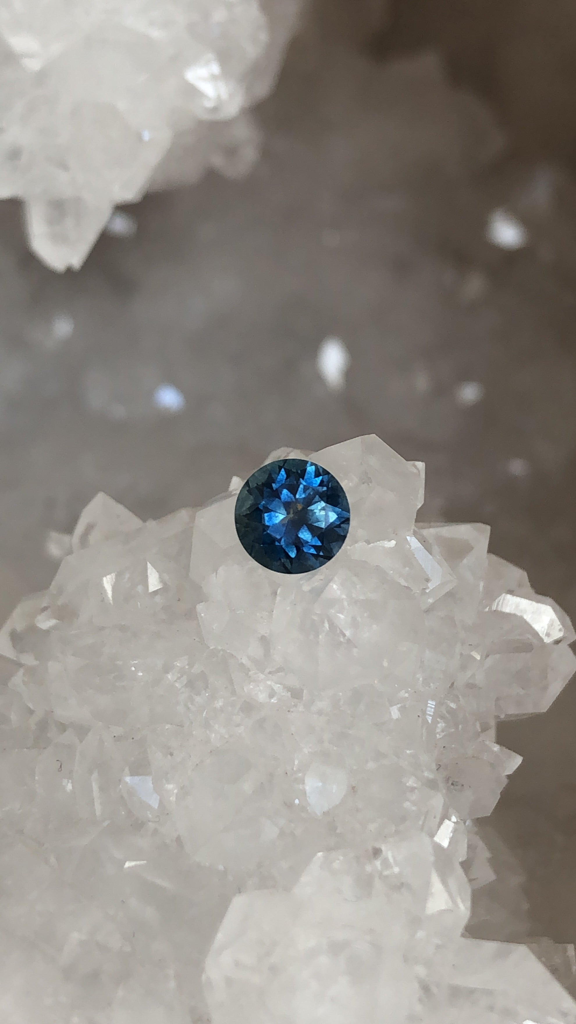 Montana Sapphire .87 CT Blue with Touch of Green Round Cut